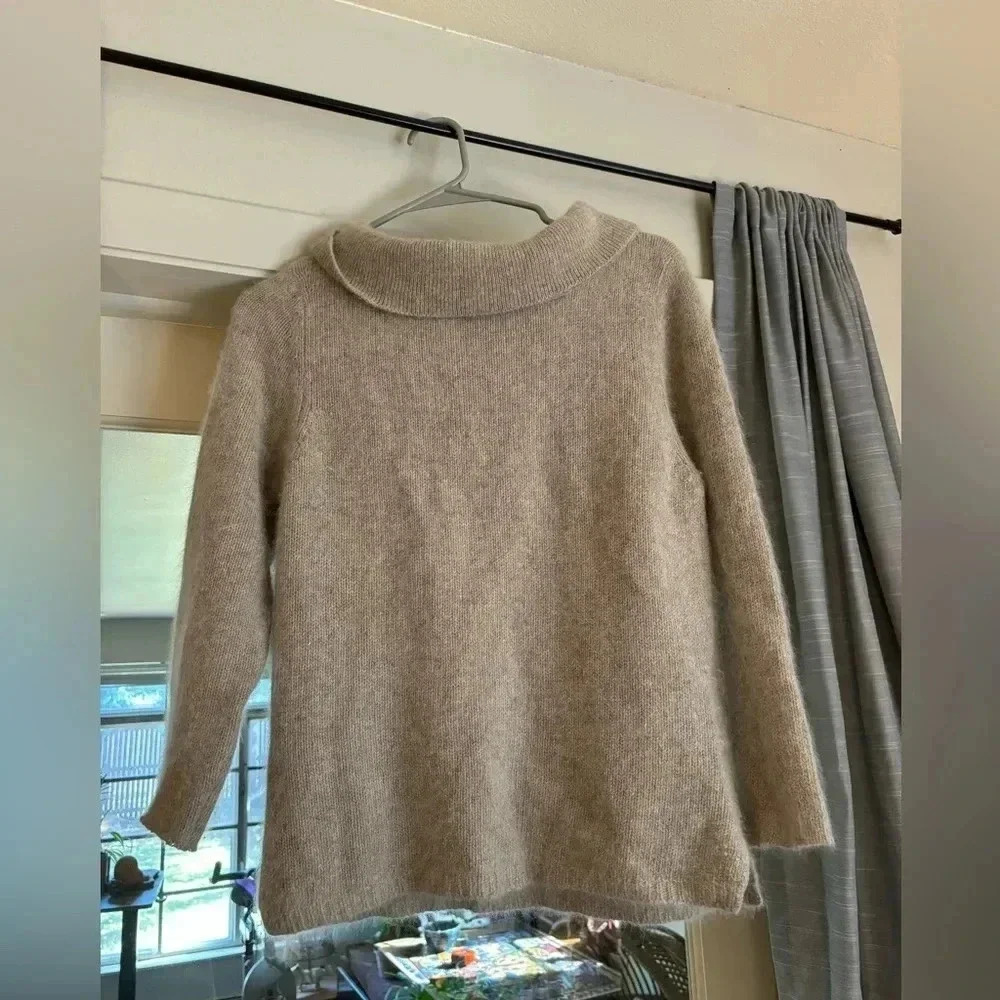 Cream colored angora sweater size medium